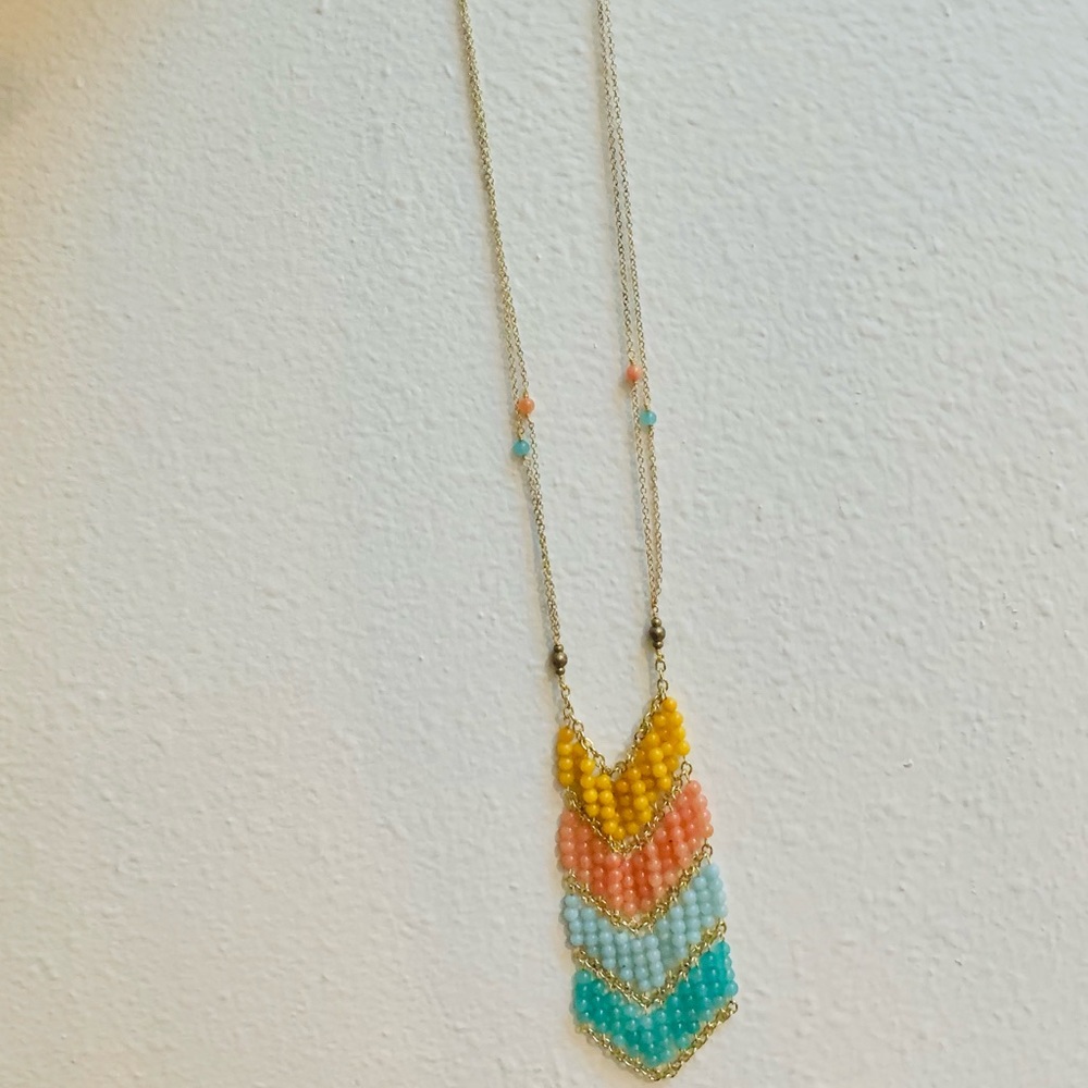 Long woven beaded statement necklace.